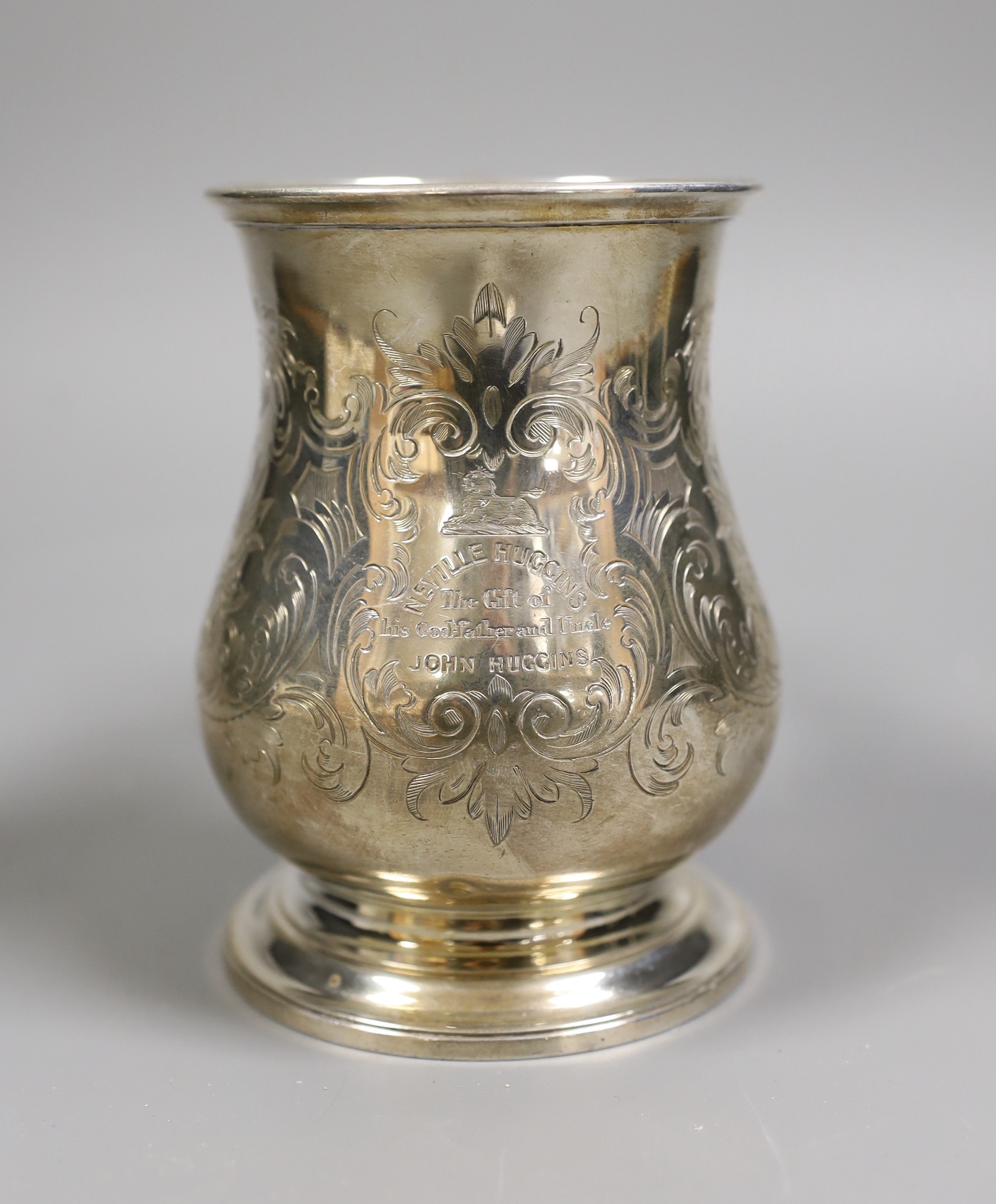 A Victorian foliate engraved silver baluster pint mug, Richards & Brown, London, 1860, height 12.7cm, 11.2oz.